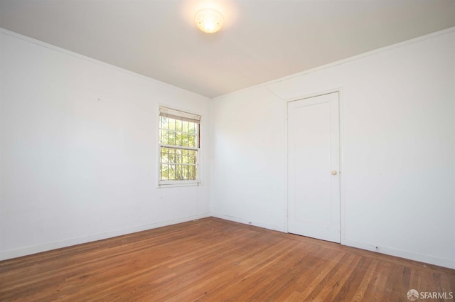 7520 Sunkist Dr, Oakland, CA 94605 - spare room with wood finished floors and ornamental molding