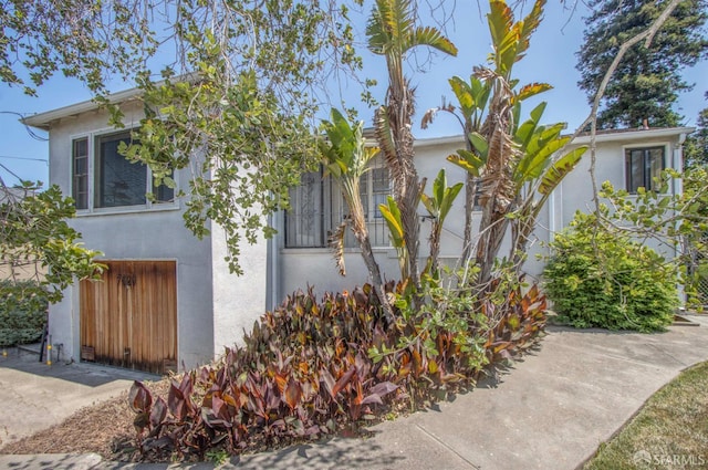 7520 Sunkist Dr, Oakland, CA 94605 - view of property exterior with stucco siding