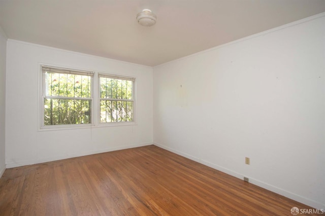 7520 Sunkist Dr, Oakland, CA 94605 - empty room with wood finished floors and ornamental molding