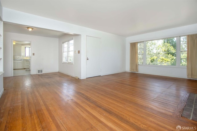 7520 Sunkist Dr, Oakland, CA 94605 - empty room with wood finished floors and baseboards
