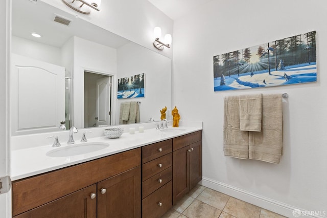 bathroom featuring vanity and tile patterned flooring