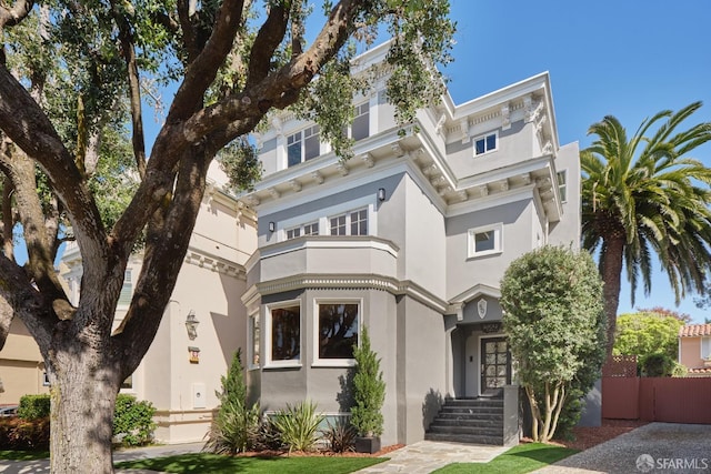 view of front of house featuring stucco siding