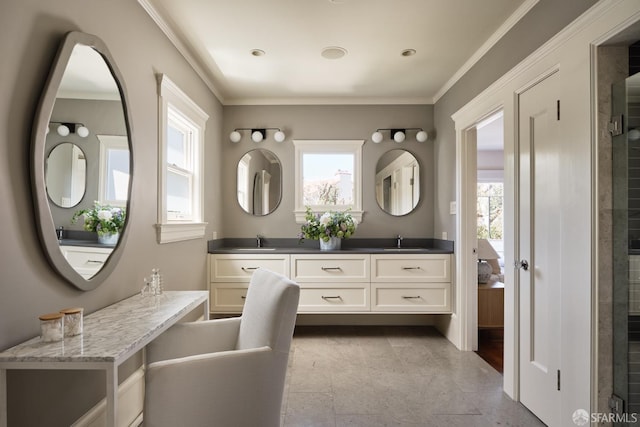 full bath featuring double vanity, a wealth of natural light, ornamental molding, and a sink