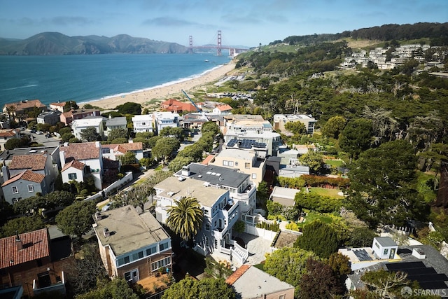 bird's eye view with a water and mountain view