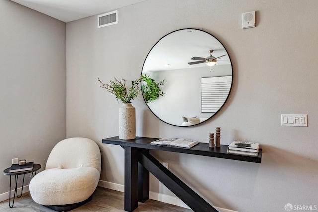 bathroom featuring ceiling fan and hardwood / wood-style floors