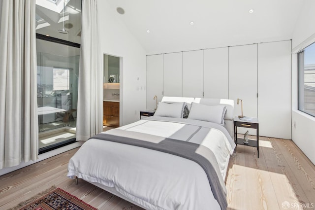 1507 Noe St, San Francisco, CA 94131 - bedroom featuring light wood-style flooring, lofted ceiling, and a skylight