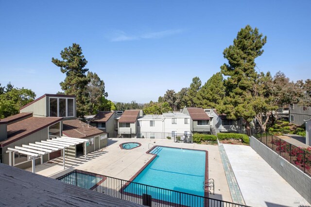 1333 N Camino Alto Unit 227, Vallejo, CA 94589 - community pool featuring a residential view, a patio area, and a community hot tub