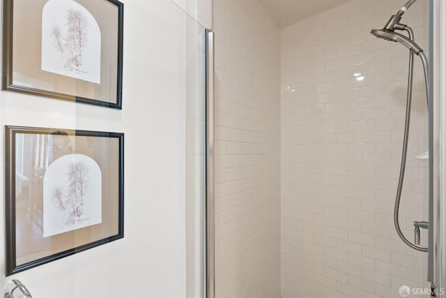 bathroom featuring an enclosed shower