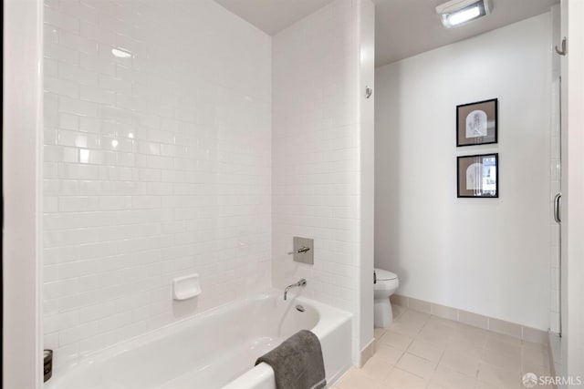 bathroom with tile patterned flooring and toilet