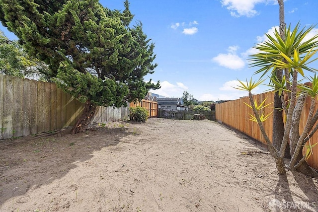 view of yard featuring a fenced backyard