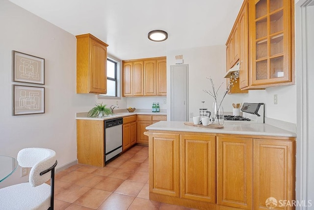 kitchen featuring range, stainless steel dishwasher, a peninsula, and light countertops