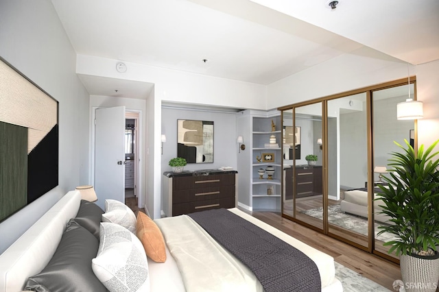 601 Van Ness Ave Unit 712, San Francisco, CA 94102 - bedroom with wood finished floors and a closet