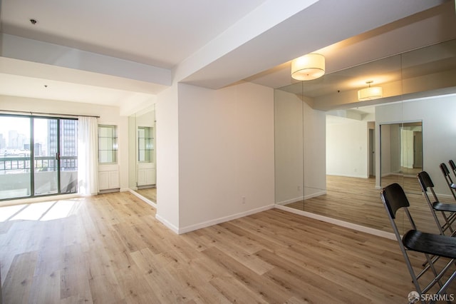 601 Van Ness Ave Unit 712, San Francisco, CA 94102 - unfurnished living room featuring light wood-style flooring