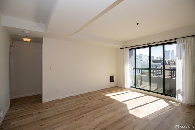 601 Van Ness Ave Unit 712, San Francisco, CA 94102 - unfurnished room featuring light wood-style floors and a smoke detector
