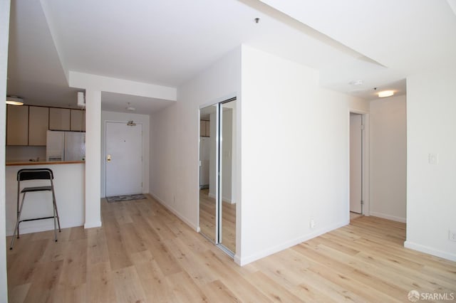 601 Van Ness Ave Unit 712, San Francisco, CA 94102 - kitchen featuring freestanding refrigerator and light wood-type flooring
