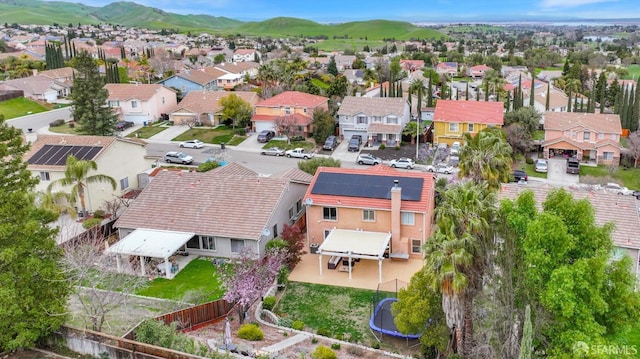 birds eye view of property featuring a residential view and a mountain view