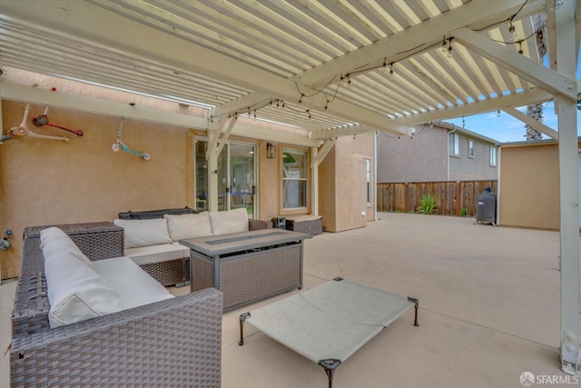 view of patio / terrace featuring fence, an outdoor living space, and a pergola