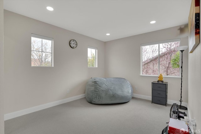 sitting room with recessed lighting, carpet, and baseboards