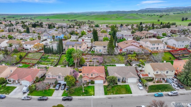 bird's eye view featuring a mountain view and a residential view