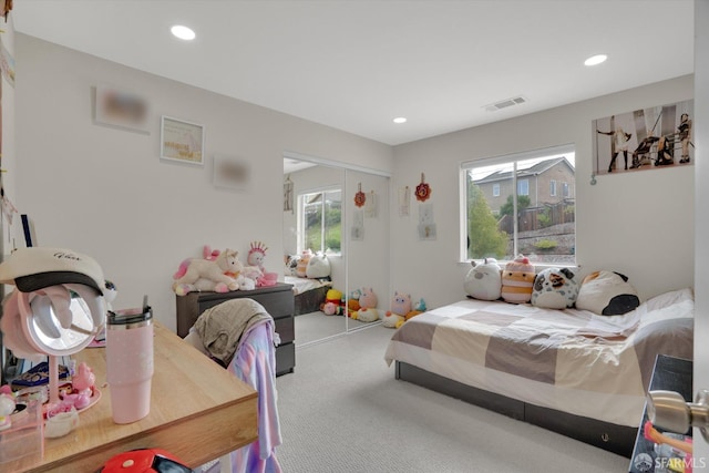 bedroom featuring carpet, visible vents, and recessed lighting