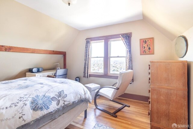 70 Laidley St, San Francisco, CA 94131 - bedroom with vaulted ceiling, light wood finished floors, and baseboards