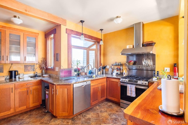 70 Laidley St, San Francisco, CA 94131 - kitchen featuring stainless steel appliances, a sink, extractor fan, wood counters, and brown cabinets