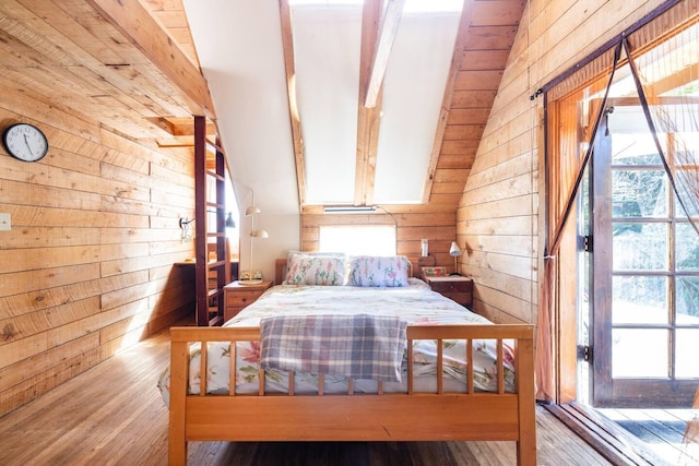 70 Laidley St, San Francisco, CA 94131 - bedroom featuring wood walls and hardwood / wood-style floors