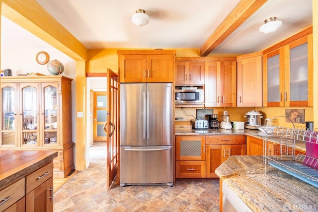 70 Laidley St, San Francisco, CA 94131 - kitchen featuring stainless steel appliances, beamed ceiling, glass insert cabinets, light stone countertops, and brown cabinetry