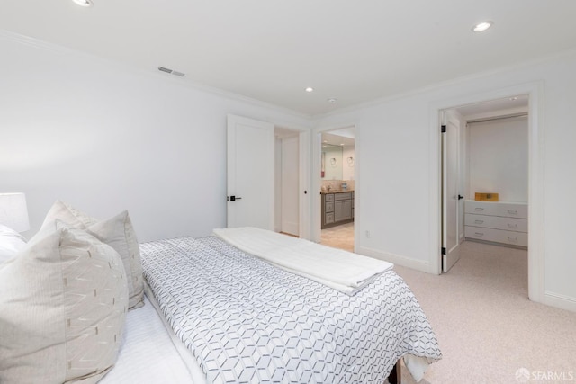 2675 Sutter St, San Francisco, CA 94115 - bedroom with crown molding, recessed lighting, light carpet, and ensuite bath