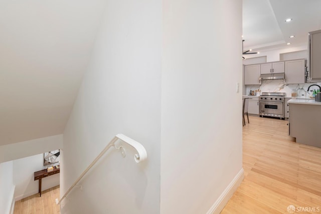 2675 Sutter St, San Francisco, CA 94115 - stairway featuring wood finished floors and recessed lighting