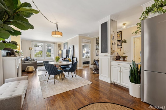 1201 California St Unit 205, San Francisco, CA 94109 - dining space featuring crown molding and dark wood-type flooring