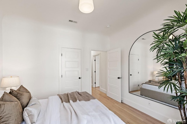 bedroom featuring light wood-type flooring