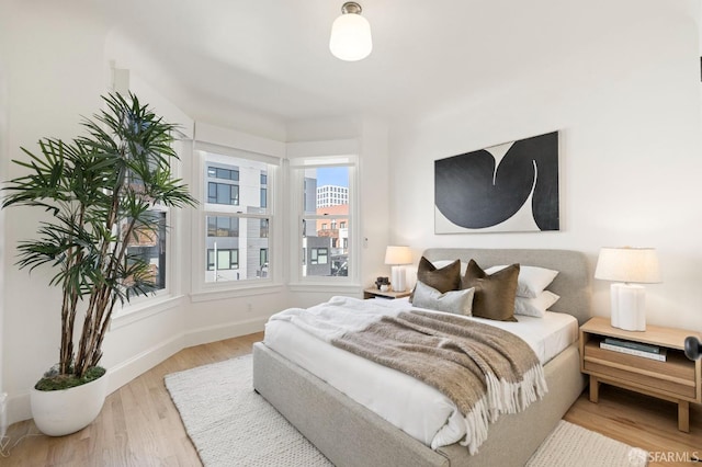 bedroom featuring hardwood / wood-style floors