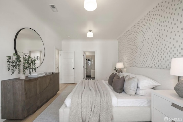 bedroom featuring light hardwood / wood-style flooring