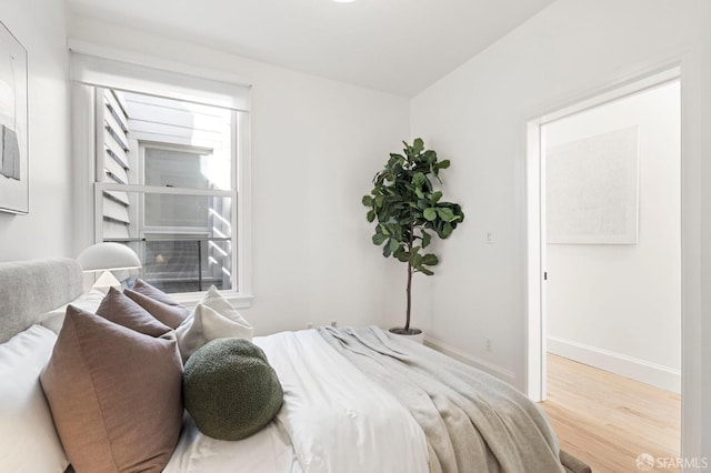 bedroom featuring light wood-type flooring