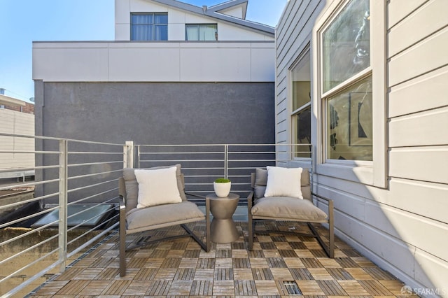 view of patio with a balcony