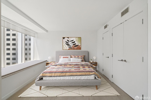 301 Mission St Unit 16H, San Francisco, CA 94105 - carpeted bedroom featuring baseboards