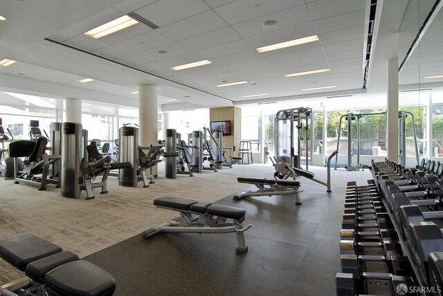 301 Mission St Unit 16H, San Francisco, CA 94105 - exercise room with a drop ceiling and carpet flooring