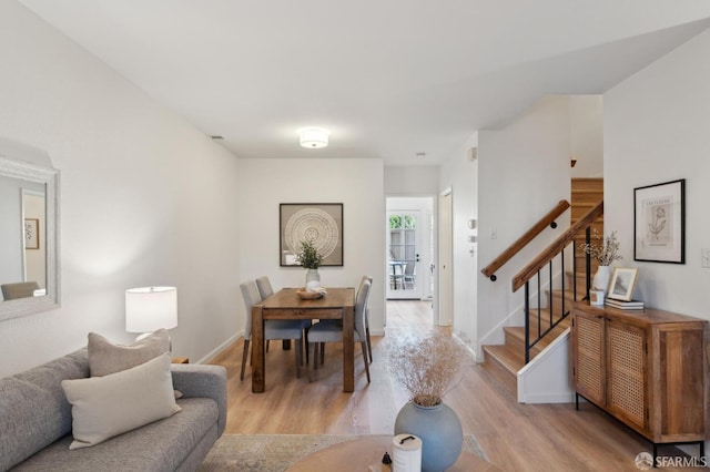 dining room featuring light hardwood / wood-style floors