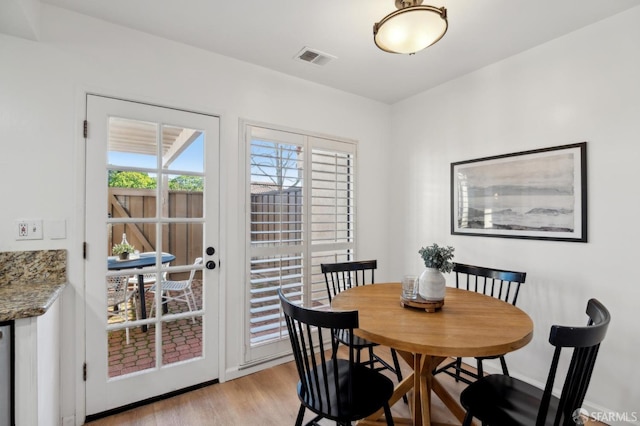 dining room featuring light hardwood / wood-style floors