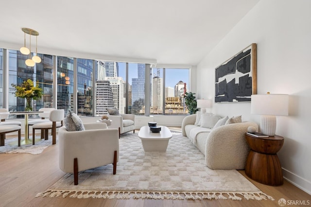 338 Main St Unit 19G, San Francisco, CA 94105 - living room with a skyline view and wood finished floors