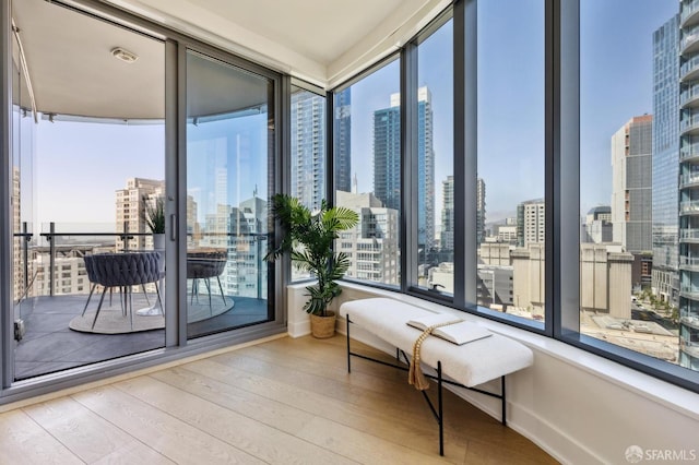 338 Main St Unit 19G, San Francisco, CA 94105 - sunroom with a skyline view, hardwood / wood-style floors, and healthy amount of natural light