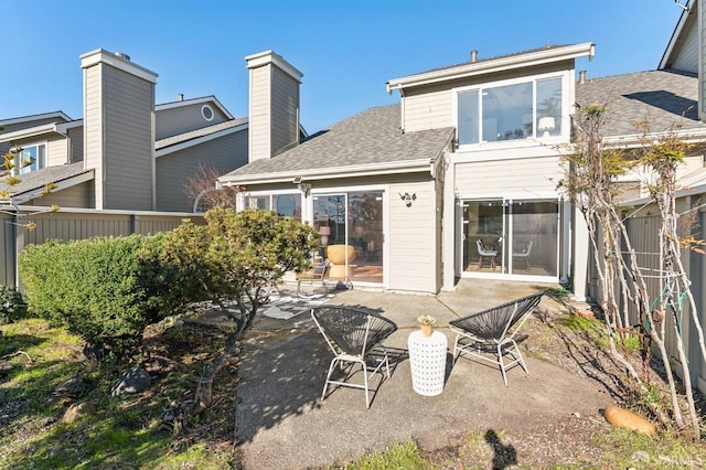 back of property featuring a patio area