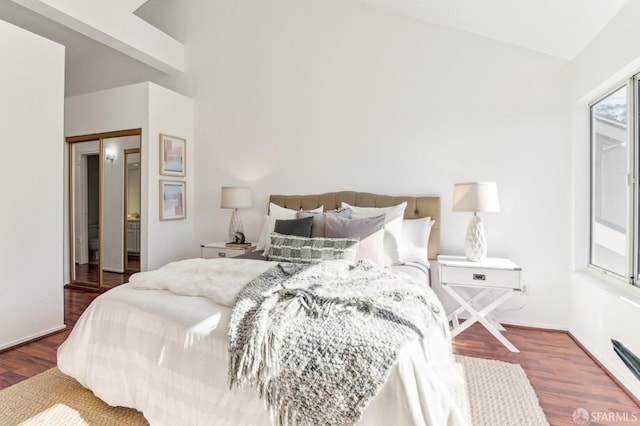 bedroom featuring hardwood / wood-style floors