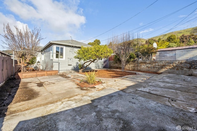 view of yard featuring a fenced backyard and a patio