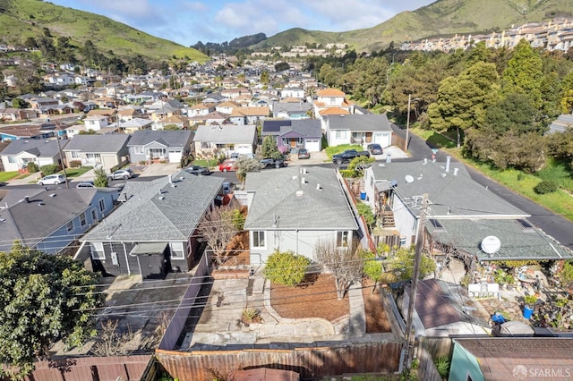 bird's eye view with a residential view and a mountain view