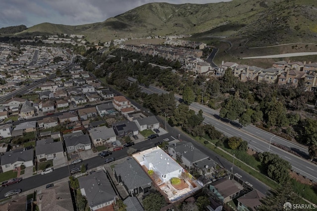 birds eye view of property featuring a residential view and a mountain view