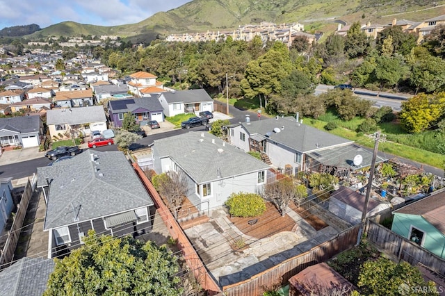 bird's eye view with a residential view and a mountain view