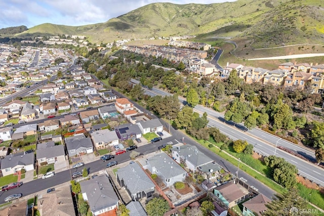 bird's eye view featuring a mountain view and a residential view