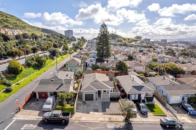 bird's eye view with a residential view and a mountain view